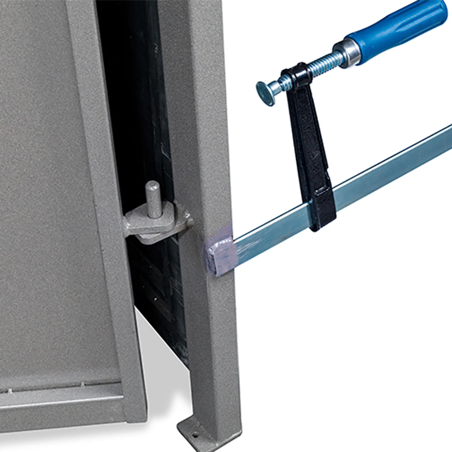 ALBA Site Door being clamped into an opening with the supplied clamp
