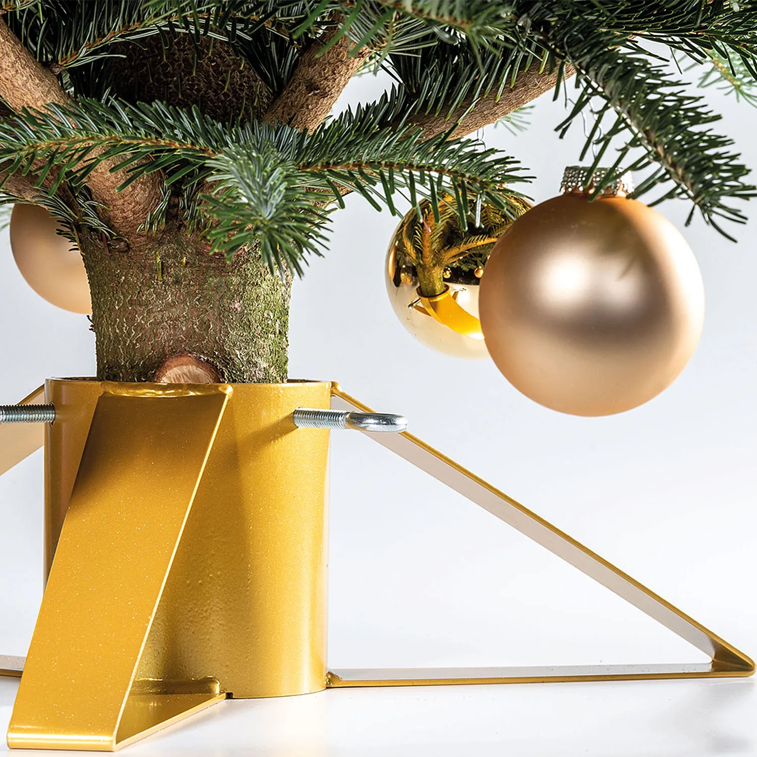 Kerstboomstandaard ALBA met boom en gouden kerstballen