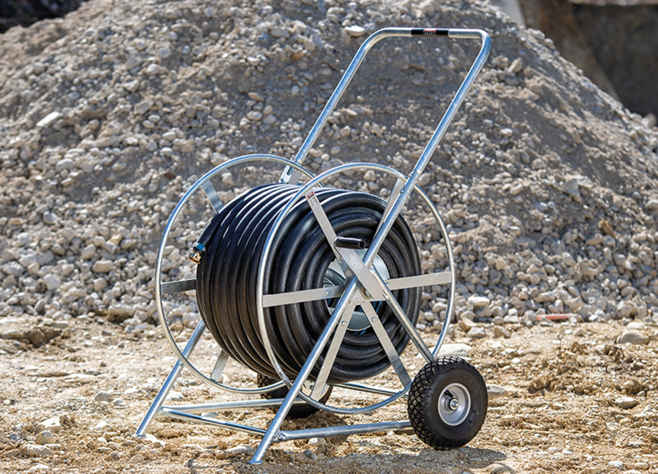 Super Profi II hose cart in use on a construction site